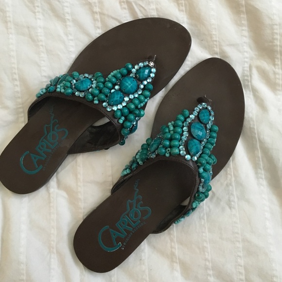 Brown and turquoise sandals.
