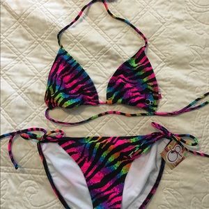 OP bikini colorful zebra stripes. Bottoms NWT!