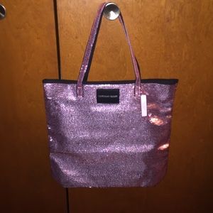 Victoria's Secret tote bag.