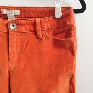 Orange skinny cords by Banana Republic.