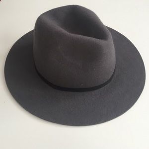 Wide brim felt hat with black tie