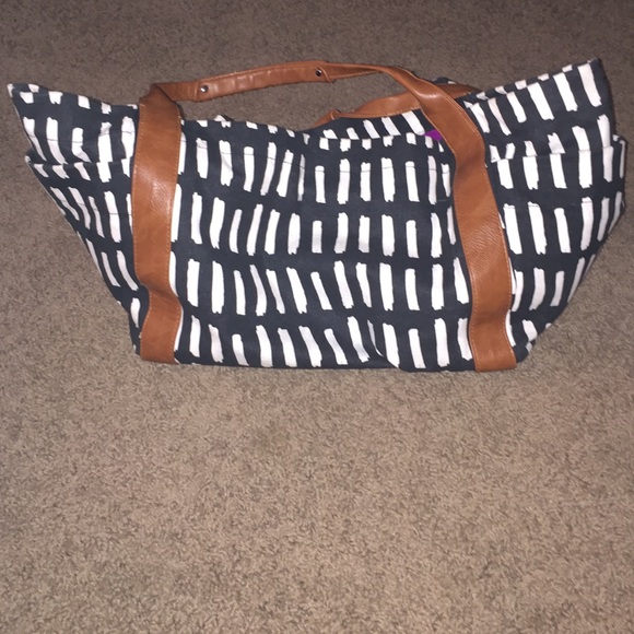 Black and white bag with pink inside