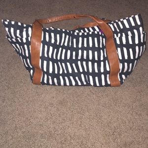 Black and white bag with pink inside