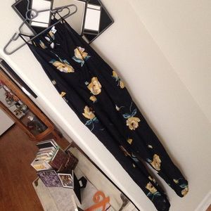 black jumpsuit with yellow flowers!