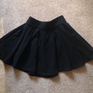 Black shirt pleated skirt