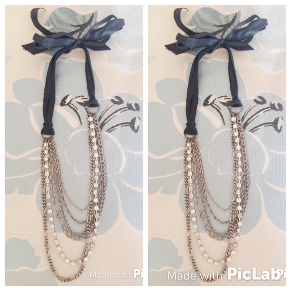 Multi Strand Silver necklace w/rhinestones