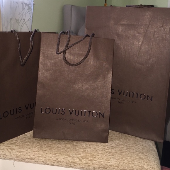 Assorted Louis Vuitton paper bags
