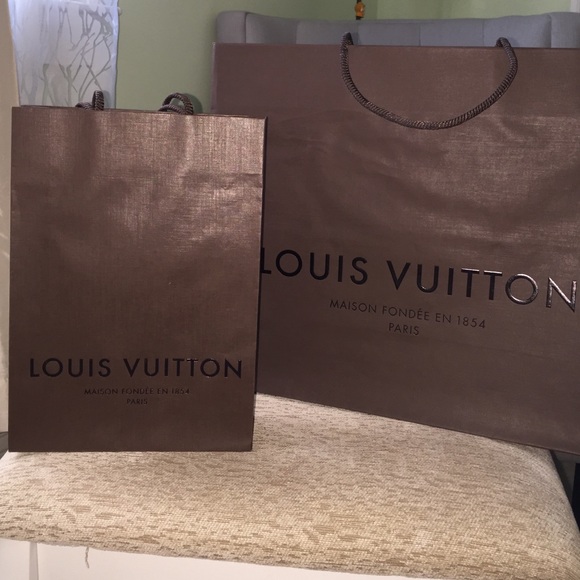 Assorted Louis Vuitton paper bags