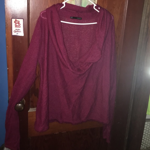Dark red wide neck sweater.