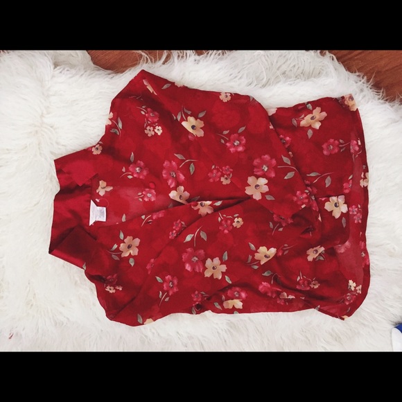 Semi sheer button up floral top.