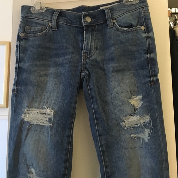 Ripped denim with sequin detailing