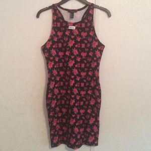 Black dress with a decoration of roses