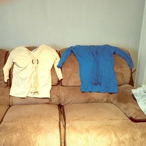 A yellow and blue tops 3 in sleeves.