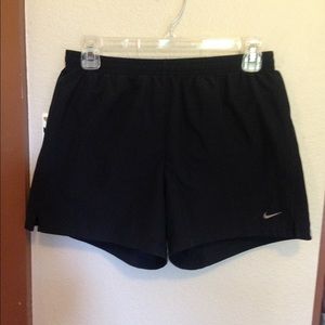 Black Nike running shorts