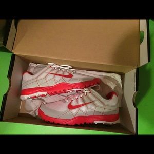 Nike girls golf shoes. Size 4 still in box.