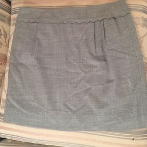 Spring grey work skirt with scallop detail
