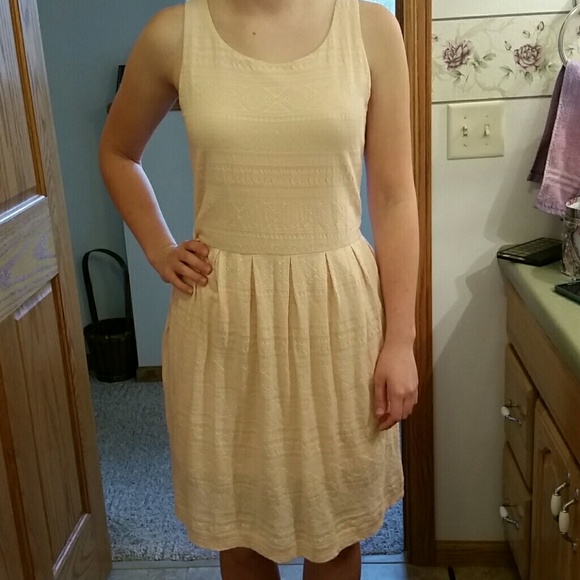 Above knee peach aztec print dress