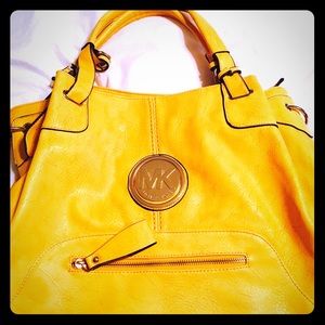 Bright yellow large hobo