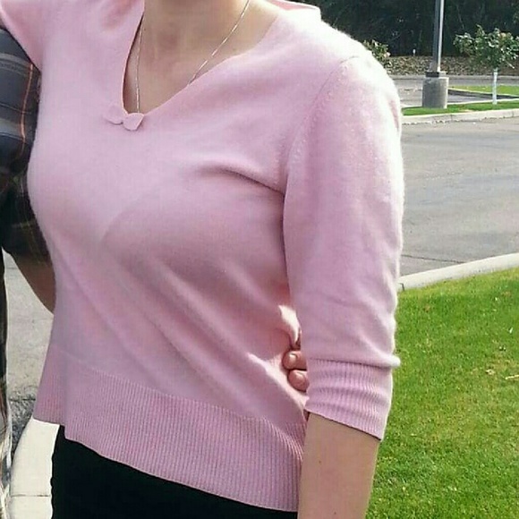 Pink cashmere sweater with bow detail