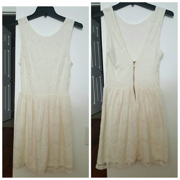 Lace dress with v shape back opening. Semi stretch