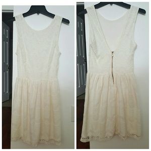 Lace dress with v shape back opening. Semi stretch