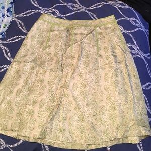 100% silk floral skirt with side buttons. LOFT