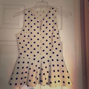 White/cream peplum with black polka dots