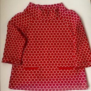 Pink and white polka dot jacquard top.