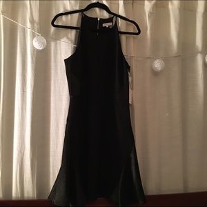1. State Fit & Flare Black Halter Cocktail Dress