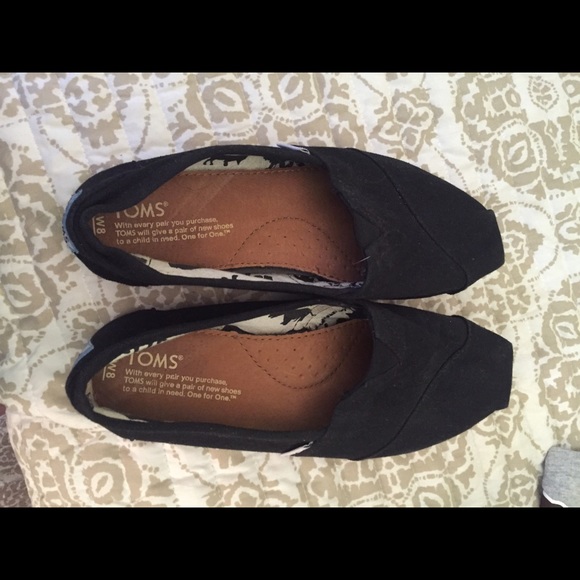 Worn a couple of times Toms