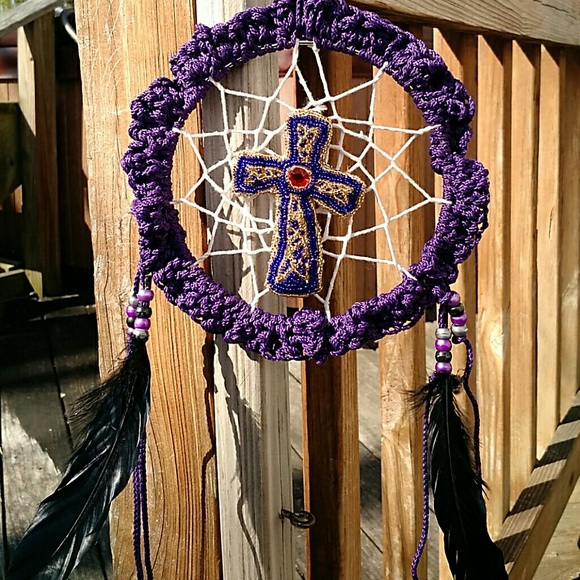 Dreamcatc55her with cross
