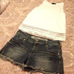 Denim shorts with fringe finish