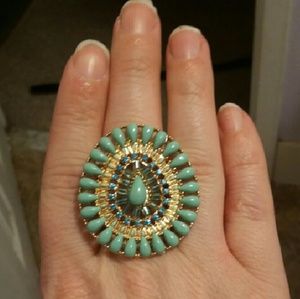 Light blue and gold ring