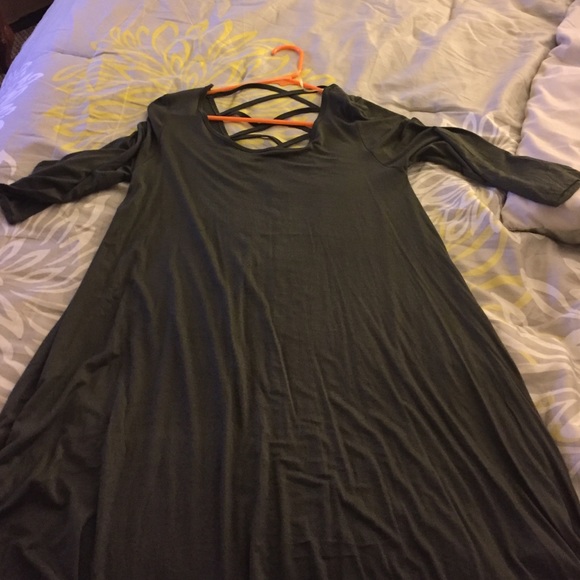 Really cute olive dress just above the knees .