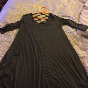 Really cute olive dress just above the knees .