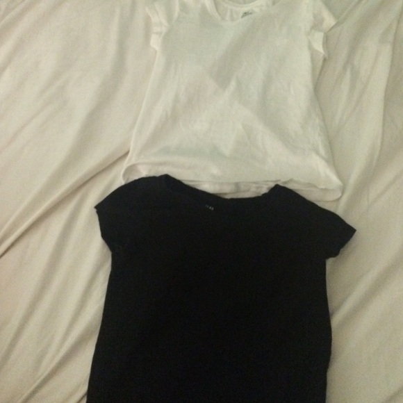 two solid colored tees