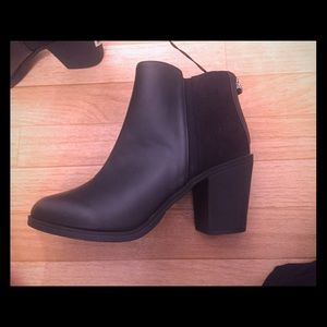 Brand new black heeled booties