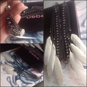 Bebe rhinestone and feather earrings