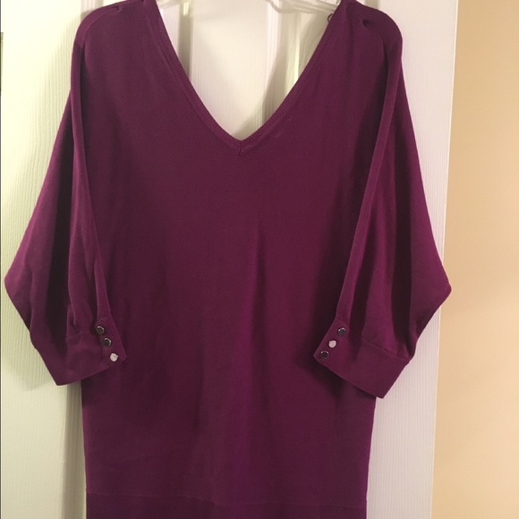 Purple sweater with silver buttons