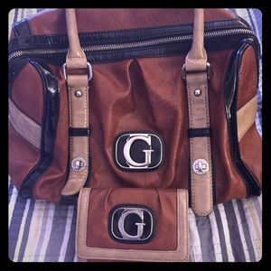 Guess satchel with matching wallet.