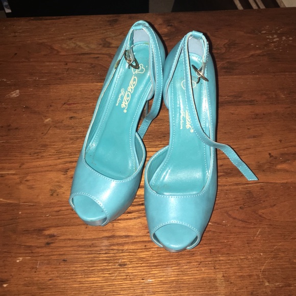 Teal high heels.