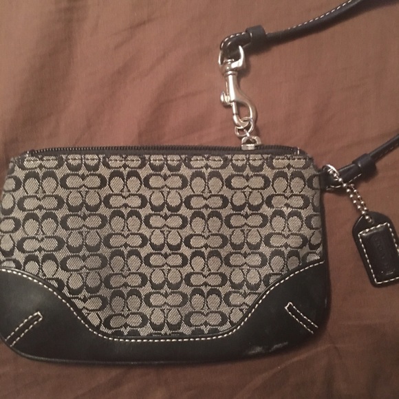 Coach wristlet black and cream. Small c