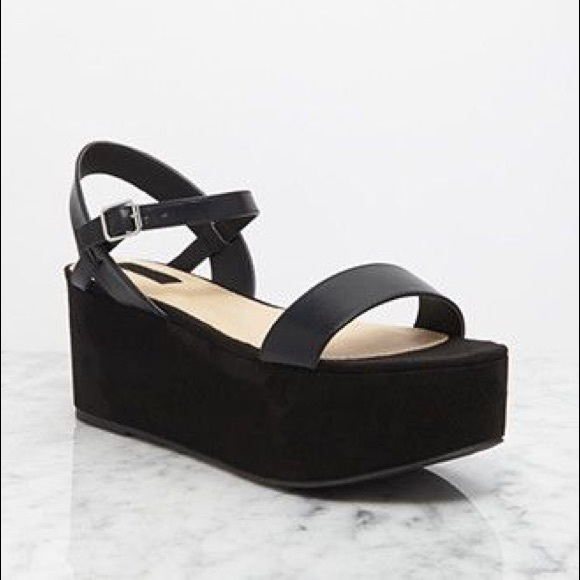 Black suede flatforms