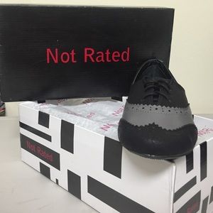 Black and grey Wingtip Oxfords