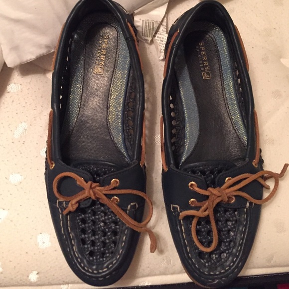 Sperrys perforated blue boat shoes