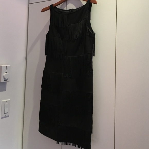 Trina Turk dressy black dress with fringe.