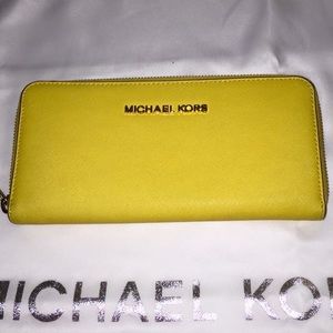 Brand new yellow mk wallet