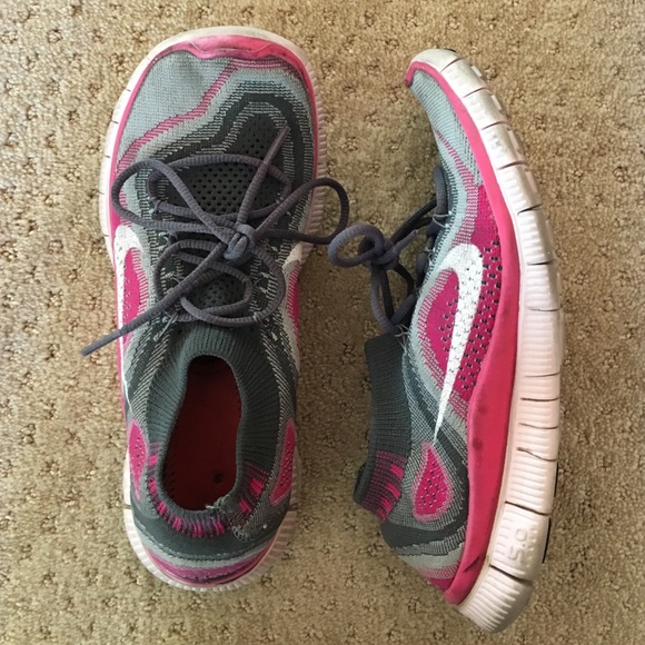 Grey & pink Nike free run 5.0