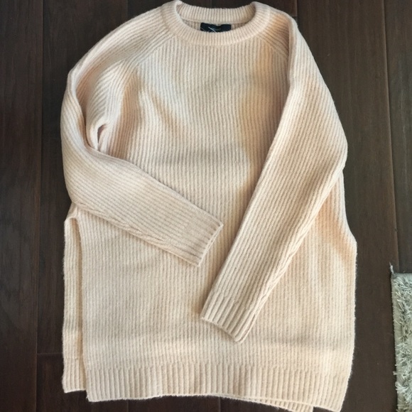 Peach knit sweater with side slit