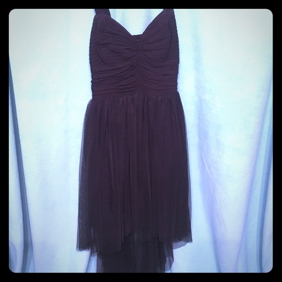 Black spaghetti strap dress sweetheart neckline.